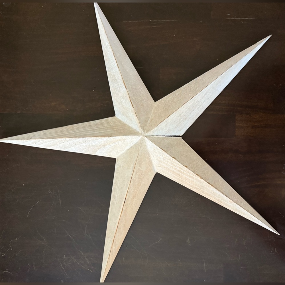 White wooden star wall decor